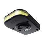 Underside view of the Ravemen FR300 ANT+ showing the mounting screws, power button and regulatory markings.