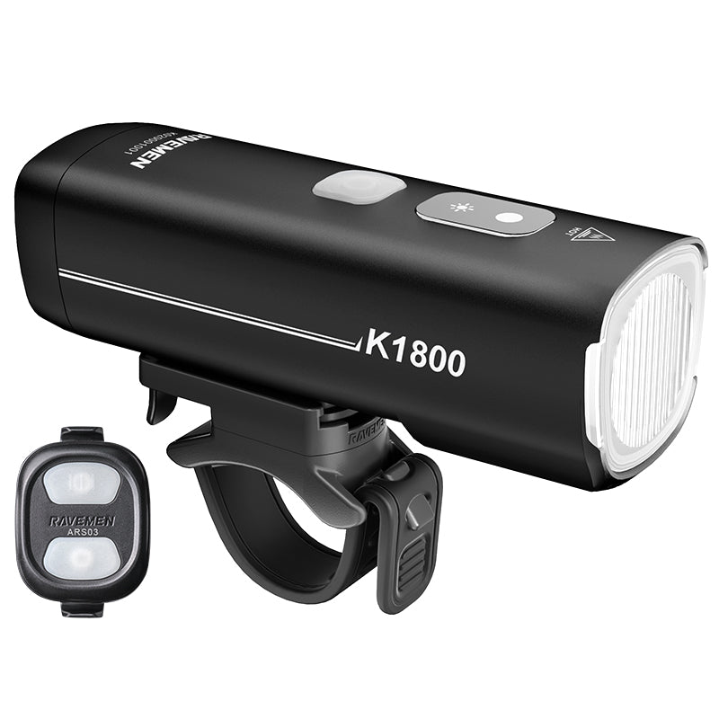 Angled view of the Ravemen K1800 bike headlight with K1800 branding and wireless remote control.