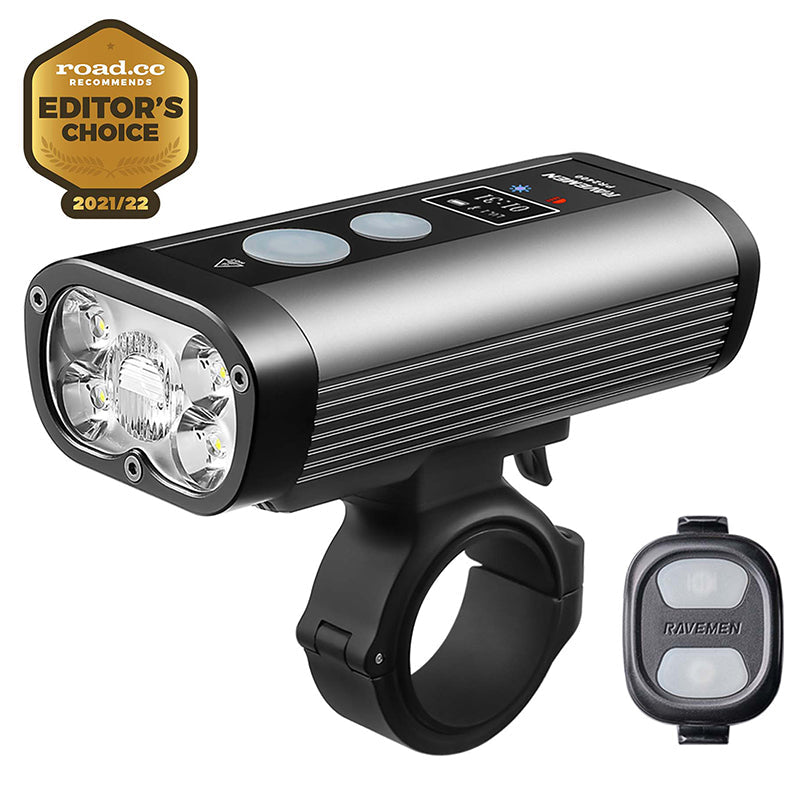 Ravemen PR2400 bike headlight mounted on handlebar next to its wireless remote switch.