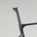Angled view of the SEKA Spear Carbon Aero Seatpost showing its aerodynamic profile.