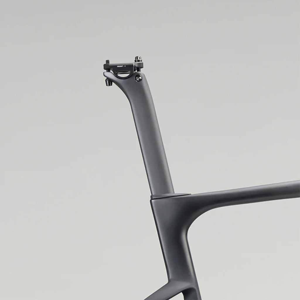 Angled view of the SEKA Spear Carbon Aero Seatpost showing its aerodynamic profile.
