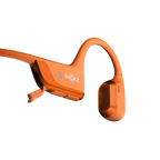 Close-up of the Shokz OpenRun Pro 2 orange headphone speaker unit and earhook detail.