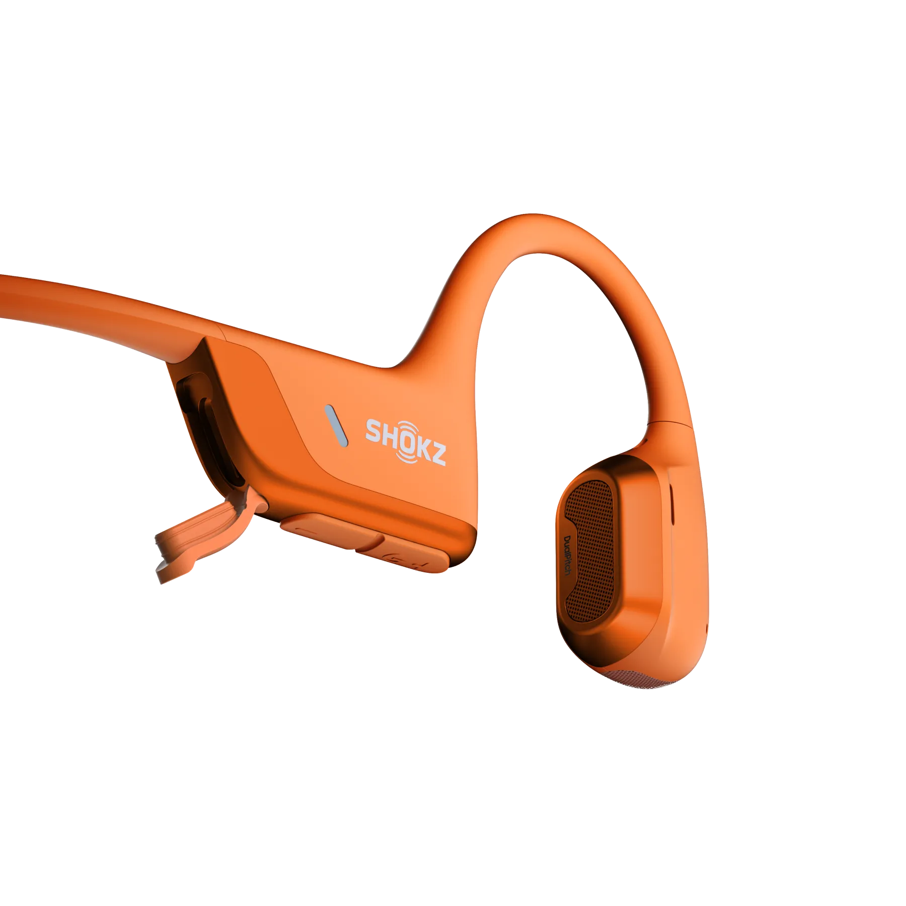 Close-up of the Shokz OpenRun Pro 2 orange headphone speaker unit and earhook detail.