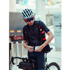 Black cycling gilet with high neck and three rear pockets