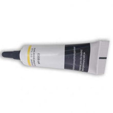  A white glue tube displayed against a white backdrop, emphasizing its sleek and minimalistic appearance