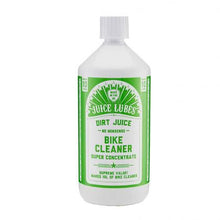 The Juice Lubes Dirt Juice Double Pack with a bicycle in the background, demonstrating the product in use to clean a muddy bike.