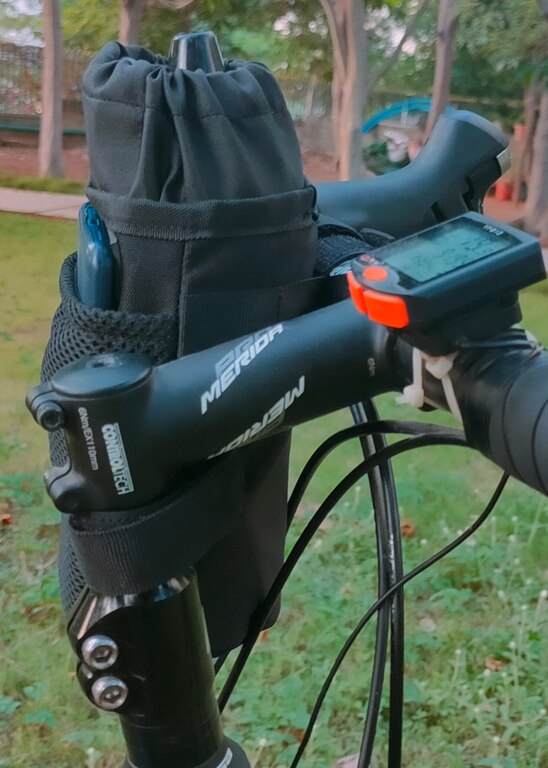 Trek N Ride handlebar pouch with a 1-liter water bottle and a 7-inch mobile phone inside