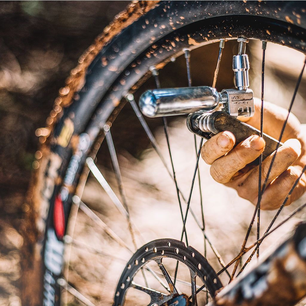 Image of the Birzman Diversity 17 Functions, a cycling multi-tool with a chain breaker and CO2 air adaptor.

