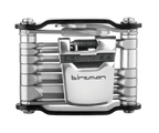 A close-up of the Birzman Feexman E-Version 20 multi-tool, showing the integrated tire levers and chain tool.

