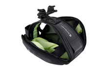 Close-up of the Birzman M-Snug Saddle Bag's interior, showing the layout for individual items.

