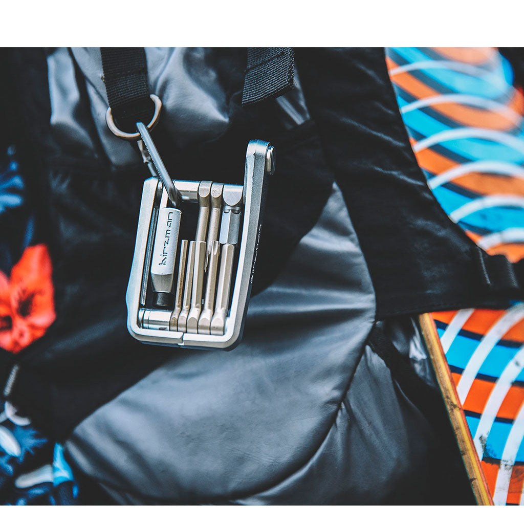 A close-up of the Birzman M-Torque 10 multi-tool, showing the precise torque indicator for carbon components.

