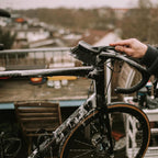 Dynamic Dirt Destroy Foam Spray (400ml) on a muddy mountain bike, showcasing its power to lift and remove heavy dirt.