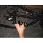 Dynamic Dry Lube Premium 100ml bottle, a high-performance chain lubricant ideal for dry and dusty cycling conditions.