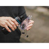 Dynamic Chain Cleaner (1 Ltr) applied to a bike chain, demonstrating its effectiveness in breaking down stubborn oil and grime.
