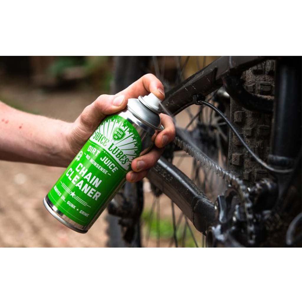 A 400ml can of Juice Lubes Dirt Juice Boss, an essential spray degreaser for thoroughly cleaning dirty bike chains and components.