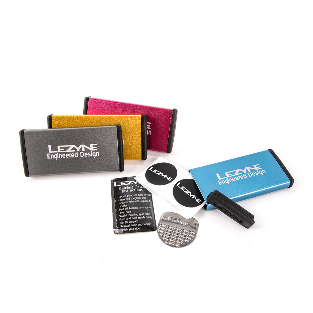 Glueless tire patch kit with stainless steel scuffer

