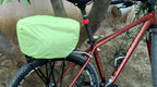 Side view of the Brevet Buddy cycle carrier bag highlighting reflective strips.