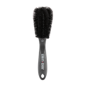 Close-up of Juice Lubes Double Ender brush, showing its two prongs and stiff bristles for effective grime removal from bike gears.

