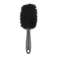 Close-up of the Juice Lubes Big Softy brush, showing its soft bristles designed for gentle yet effective bike washing.