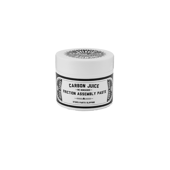 Close-up of Juice Lubes Carbon Juice (50ml), highlighting its formula for increasing grip and preventing slippage on carbon components.