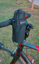 Close-up of the Trek N Ride handlebar bag showing the secure Velcro strap attachment.
